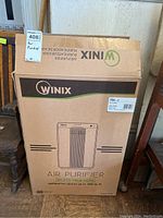 Original boxed Winix air purifier model 5500-2 with label and branding visible.