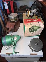 Group shot of four reels on tabletop