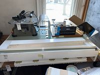 Full view of light table with glass top and painted frame