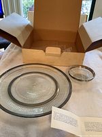 Set comprising large chip plate, smaller dip plate, and a dip bowl in original open box with manufacturer's note insert.