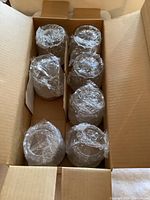 Box with 8 sealed crystal glasses wrapped in plastic
