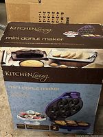 Box of Kitchen Living mini donut maker showing product image and features