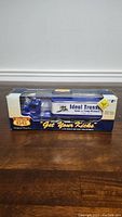 Front view of boxed 1950 Chevy tractor trailer die-cast model showing Ideal Trans branding and Route 66 themed packaging.