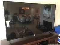 Front view of the television on stand