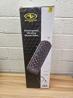 Front view of the boxed 18 inch rechargeable vibrating muscle roller from Athletic Works showing product image and branding.