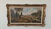 Full front view showing the framed signed oil painting of the pastoral landscape with sheep and figures.