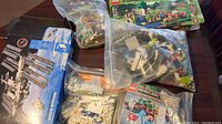Photo showing LEGO International Space Station box and large plastic bag of pieces