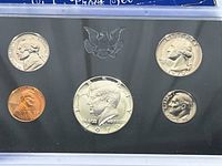 Top side of the 1970 United States Proof Set showing the obverse sides of the coins in the original plastic holder.