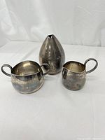 Three pieces displayed together from front view