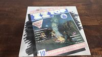 Front cover of The Best Of ZZ Top vinyl album showing campfire scene and album title.