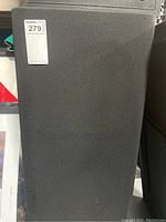 Speaker cabinet front with cloth grille attached