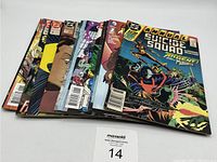 Lot of 15 Suicide Squad comic books stacked and fanned out showing various covers and characters.