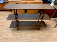 Full front view of three-tier shelf