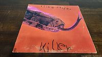 Front cover of the Alice Cooper 'Killer' vinyl record showing the snake artwork and title.