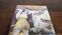 Front cover of the Bob Dylan 'Knocked Out Loaded' vinyl album showing full artwork and album title.