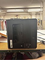 View of Brother printer from top showing paper output and control buttons.