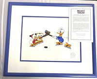 Framed serigraph cel artwork showing Donald Duck and nephews from scene 26, with Certificate of Authenticity included in frame.