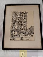 Framed charcoal drawing showing full artwork and frame
