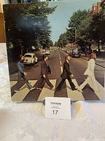 Front cover showing The Beatles crossing Abbey Road pedestrian crossing