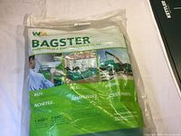 Packaged new Waste Management Bagster dumpster bag with printed instructions and product images on the bag packaging.