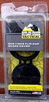 Front view of the Butler Creek Tactical One Piece Flip-Cap Scope Cover in packaging showing brand, fit size, and product type.
