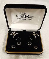 Image of Louis Roth boxed set showing pair of cufflinks and four shirt studs with black onyx stones in silver-tone settings.