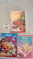 Image of three Barbie DVD box sets: A Christmas Carol, The Diamond Castle, Thumbelina.