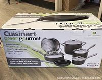 Closed retail box front showing Cuisinart Green Gourmet branding and set illustration