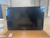 Front view of the 32 inch Panasonic LCD TV model TC-L32C5 showing the screen and black bezel with Panasonic branding.