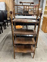 Full front view of the vintage wood and bamboo shelving unit, showing the five wooden shelves and bamboo frame.