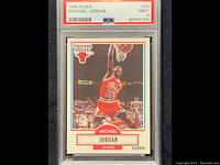 Front of Michael Jordan 1990 Fleer basketball card graded PSA Mint 9, showing image of Jordan dunking and card details.