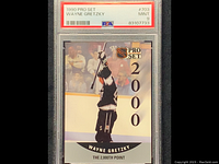 Front photo of the Wayne Gretzky 1990 Pro Set card graded Mint 9 by PSA with image of Gretzky raising hockey stick and '2000' on the side