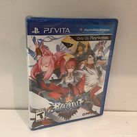 Front view of sealed PS Vita game BlazBlue: Continuum Shift Extend featuring anime characters on cover art.