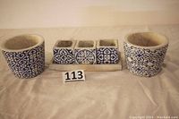 Five blue and white ceramic pots for plants: two round pots and three square pots on a rectangular tray showing overall lot contents.