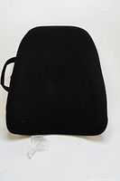 Front view of black Obus Forme back support cushion with fabric cover and ergonomic shape.