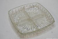 Clear square crystal tray with four compartments and floral pattern, showing detail and condition