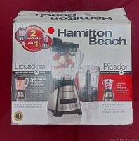 Photo of Hamilton Beach 2-in-1 blender and chopper box showing product details in Spanish describing 5-cup blender and 3-cup chopper