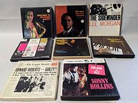 Eight cassette tapes arranged in two rows showing front covers