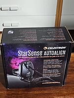 Box front displaying Celestron StarSense AutoAlign branding and product imagery