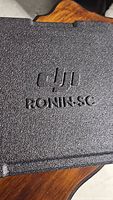 Close-up of the DJI Ronin-SC labeled carrying case foam lid