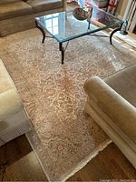 Full view of rug under coffee table