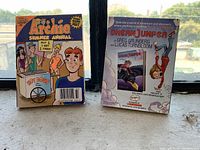 Back covers of two Archie Summer Annual digest comics showing colorful comic artwork and promotional content