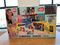 Front of the L.O.L. Surprise! Clubhouse box showing overall view of the clubhouse, dolls, and accessories included.
