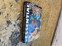 Front and spine of the comic book showing title and volume number.