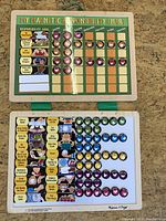 Top view of My Magnetic Responsibility Chart showing the magnetic board with days of the week grid, responsibility goals, and multiple colored magnets with symbols.