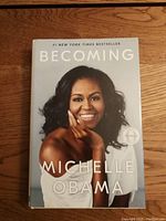 Front cover of the 'Becoming' book showing Michelle Obama's portrait and title