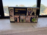 Front of the game box showing the game title and thematic TV series iconography.