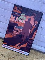 Front view of the Godfather poster with scene of man in trench coat at market