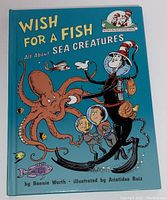 Front cover of the book showing Cat in the Hat with sea creatures, including octopus and fish