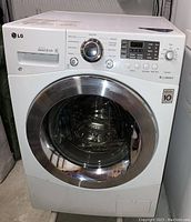 Front view of LG washer dryer combo unit showing door and front panel